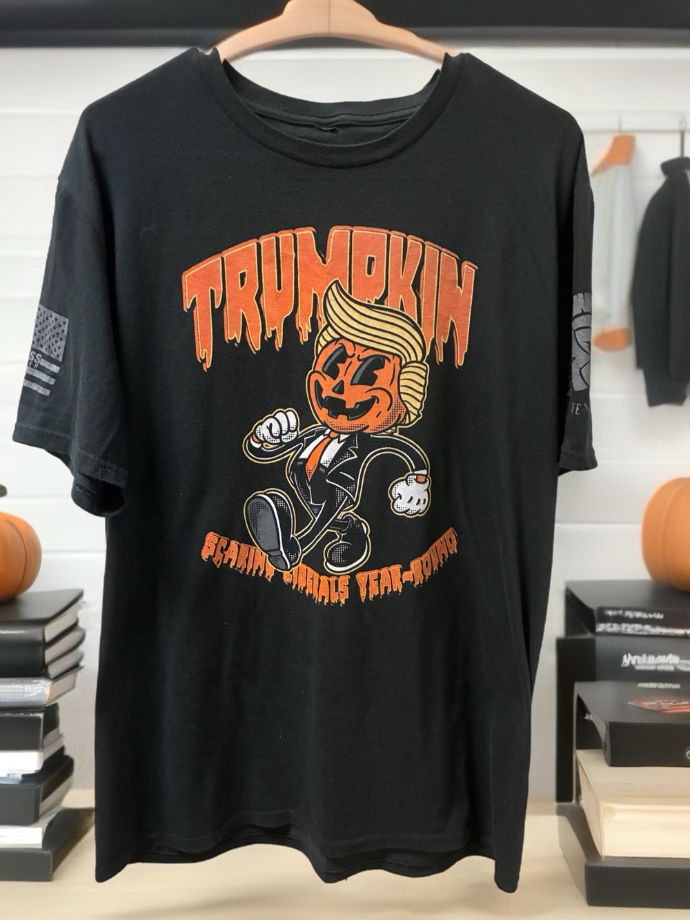 Black Short Sleeve Graphic Tee with Orange Pumpkin Character Trump
